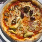 Real Italian pizza with olives in Trieste